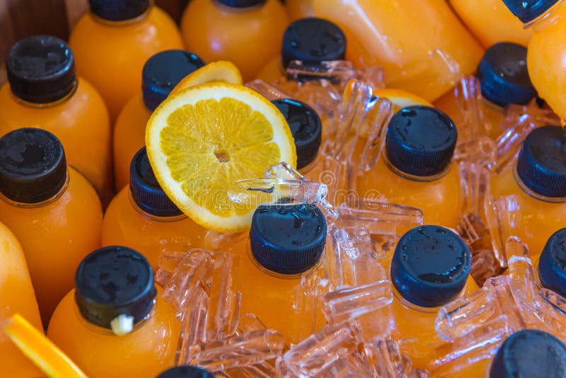 Orange Juice in Water Cooler for Breakfast at the Hotel Stock Photo