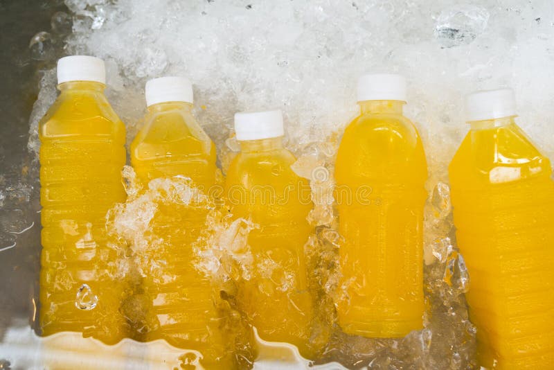 Orange Juice in Bottles on Display for Sale Stock Photo Image of