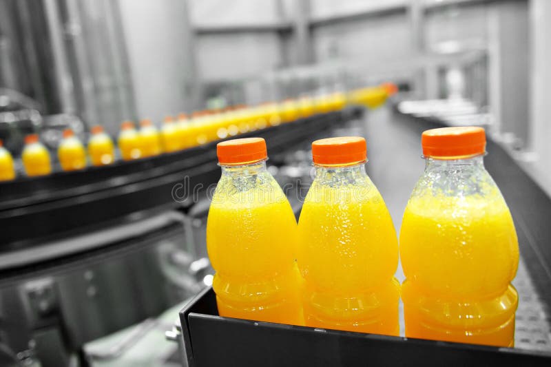 Orange Juice Factory stock image. Image of container - 34979611