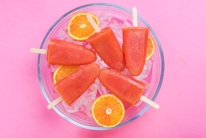 Orange Juice Healthy Popsicles Over Ice Cubes Stock Photo Image of