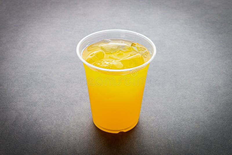 https://thumbs.dreamstime.com/b/orange-juice-ice-plastic-cup-dark-gray-background-orange-juice-ice-plastic-cup-173517807.jpg