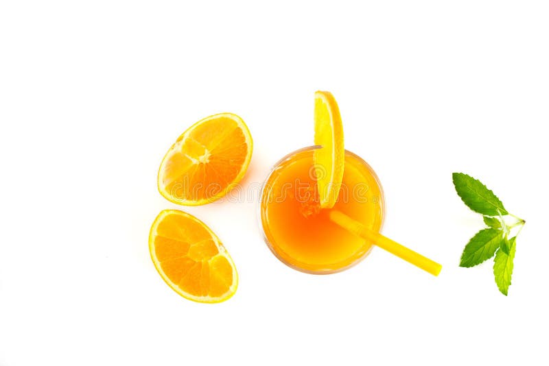 Orange juice with mint and slices of fresh orange top view on white background