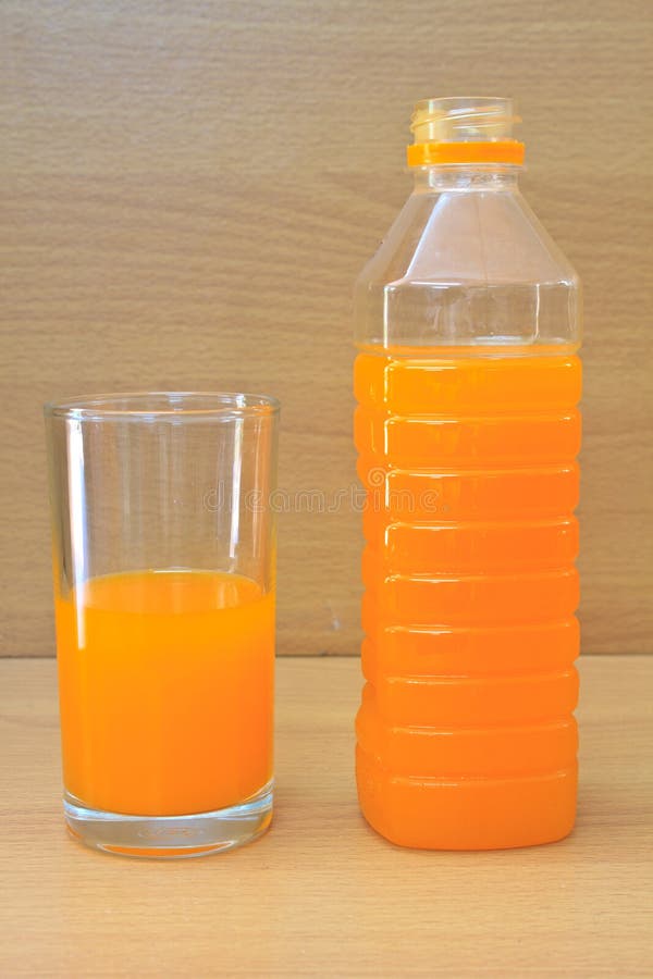 Plastic Bottle And Glass Of Orange Juice Stock Photo Image of orange