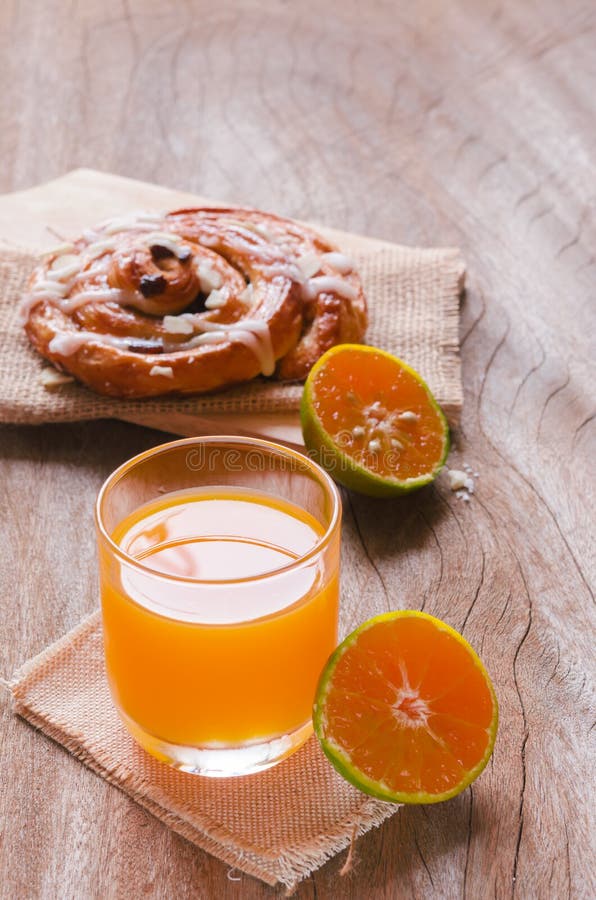 Orange Juice and Raisin Cinnamon Roll Stock Photo Image of bakery