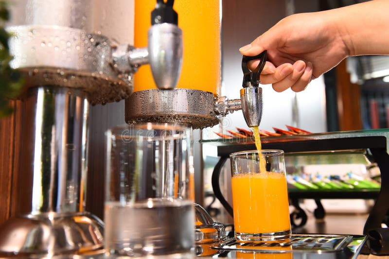 Orange Juice and Water in Water Cooler Stock Photo Image of modern