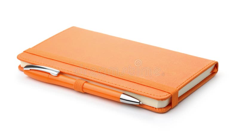 Orange leather notebook and ballpoint pen stock image