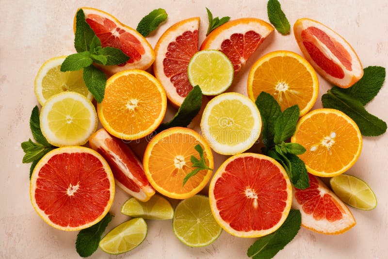 Orange, Lemon, Grapefruit, Mandarin and Lime on Trendy Pink Stone or ...