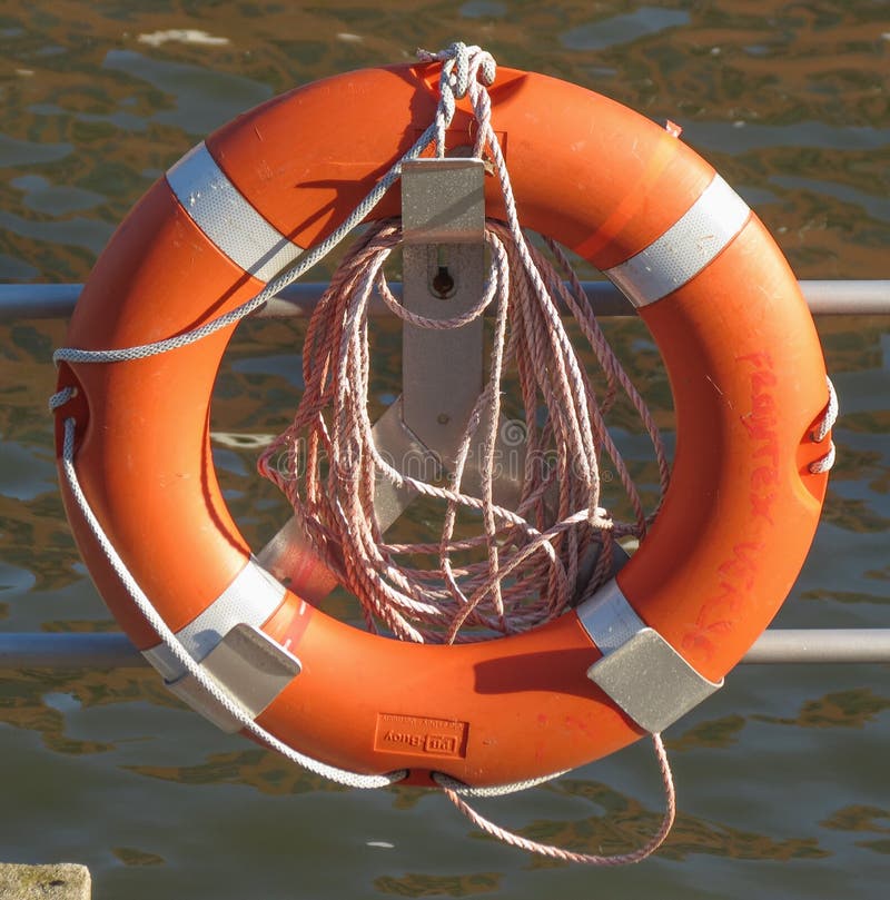 Orange life buoy editorial stock image. Image of life - 82586529