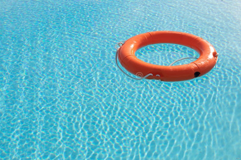 Orange Lifebuoy Floating On A Pool Stock Photo - Image of outside ...