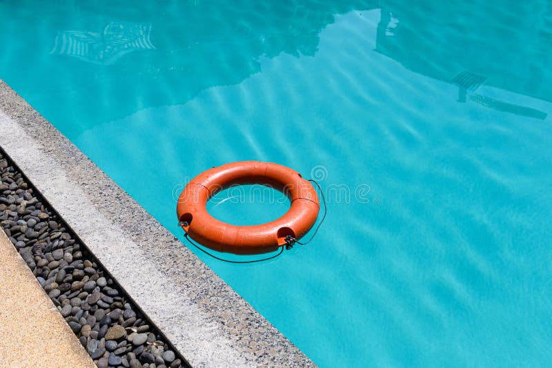 Orange Lifebuoy Floating on Surface Swimming Pool Stock Image Image
