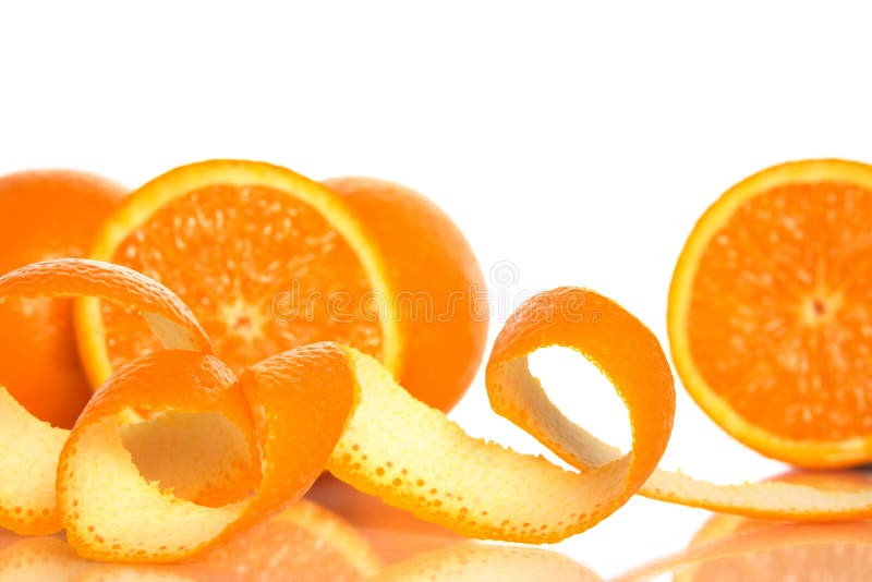 Orange peel and juicy oranges