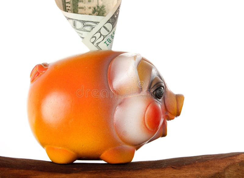 Orange piggy bank with us money