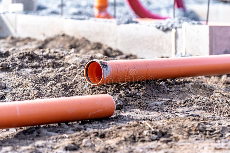 Orange PVC Plastic Pipes on the Construction Site Stock Photo Image