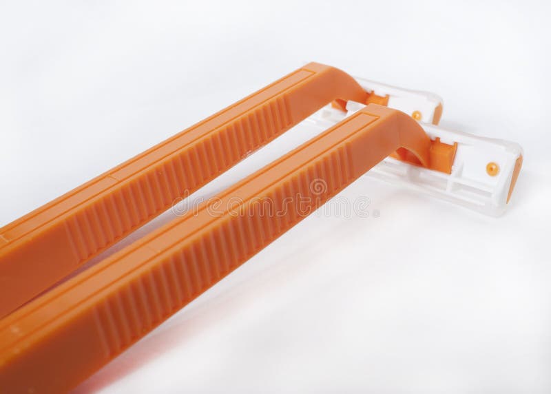 Orange razors stock photo. Image of shaving, background 82289420