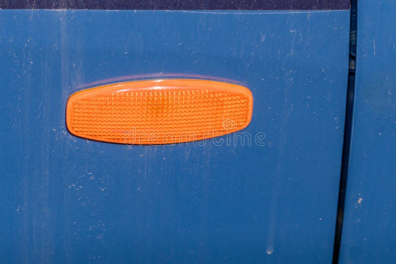 Orange Reflector on Side of Vehicle Stock Image Image of auto, orange