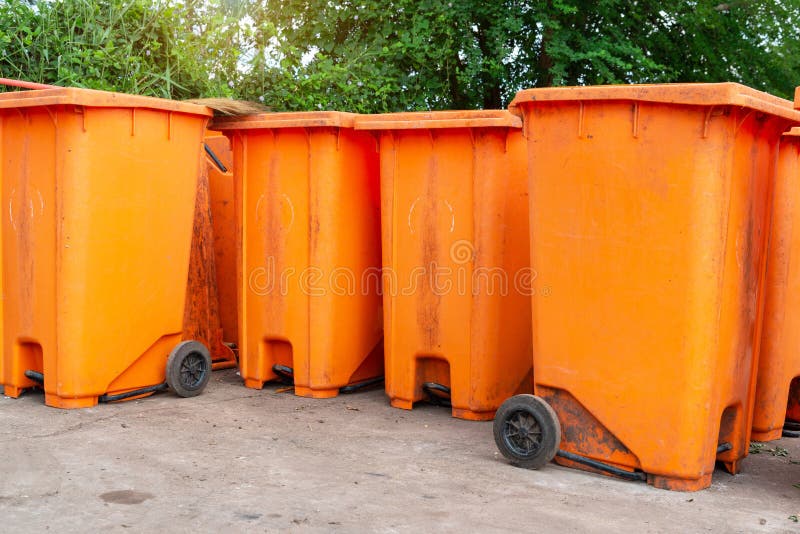 Orange rubbish bin stock photo. Image of trash, recycle 232991972