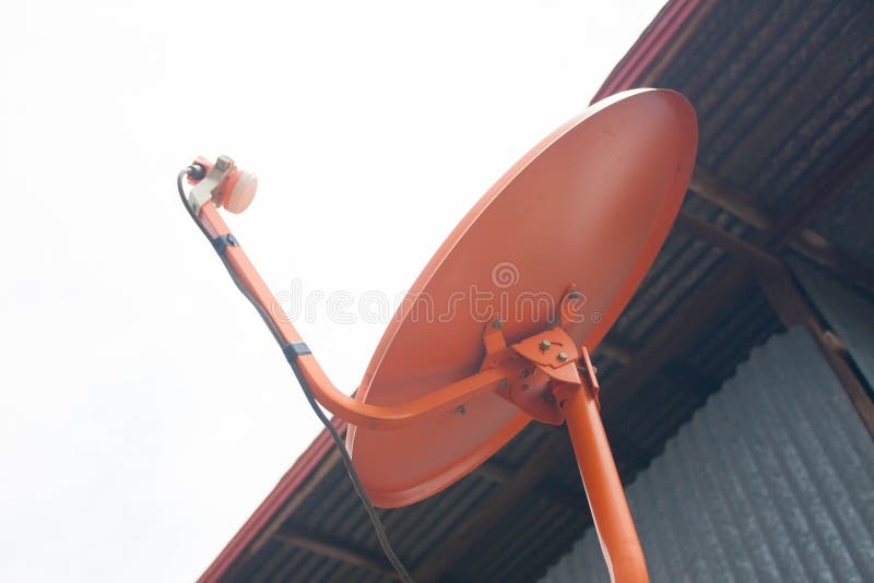 Orange Satellite Dish Dish for Receiving TV Signals Attached To the