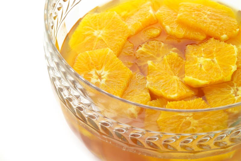 Orange slices marinading in a crystal bowl
