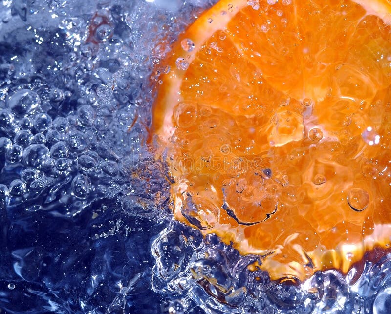 Orange splashing water