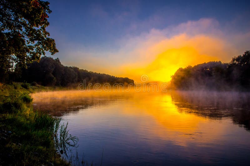 Sunset In The Neighborhood And Reflections In The River Stock Photo,  Picture and Royalty Free Image. Image 96533227.