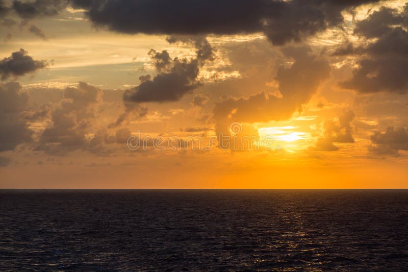 Orange Sunset Over Grey Seas