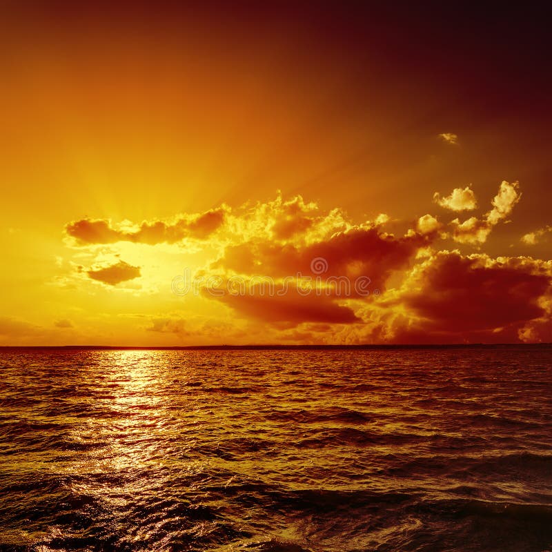 Orange sunset over water