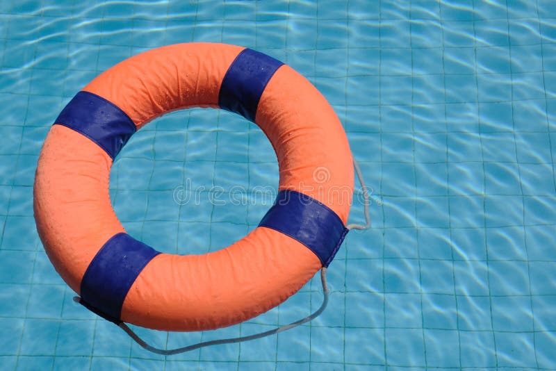 Orange Swim Ring Floating on Water Stock Photo Image of green, plastic 36217250