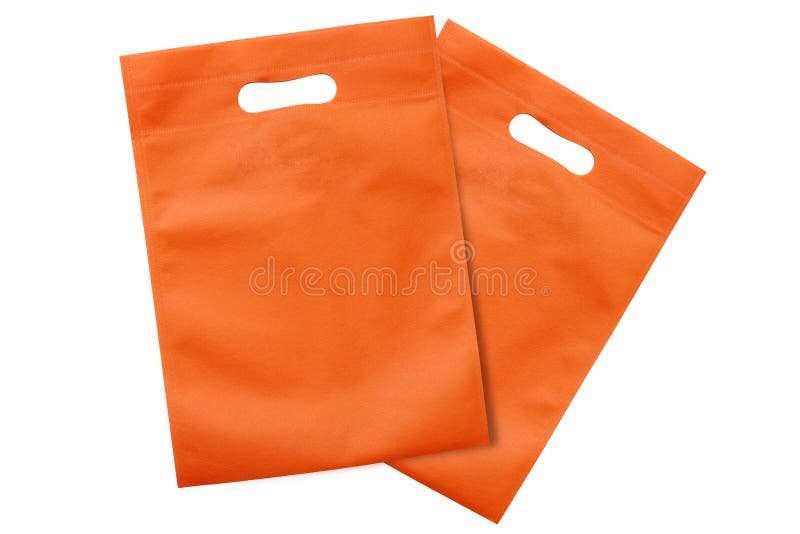 Orange Taschen, eco Stoff bauscht sich, um die globale Erwärmung, Einkaufstaschen, die Plastiktasche zu verringern und bereitet T lizenzfreies stockfoto Orange Taschen, eco Stoff bauscht sich, um die globale Erwärmung, Einkaufstaschen, die Plastiktasche zu verringern und bereitet T lizenzfreies stockfoto