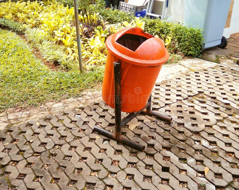 An Orange Trash Bin in the Park Stock Photo Image of orange