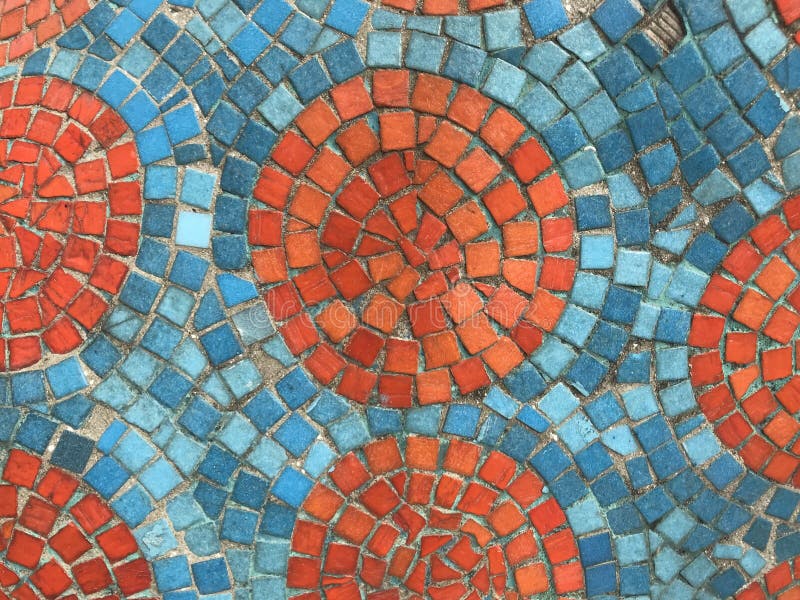 Orange und blaue Stücke des quadratischen Mosaiks geschaffen als überraschendes Muster lizenzfreies stockfoto Orange und blaue Stücke des quadratischen Mosaiks geschaffen als überraschendes Muster lizenzfreies stockfoto