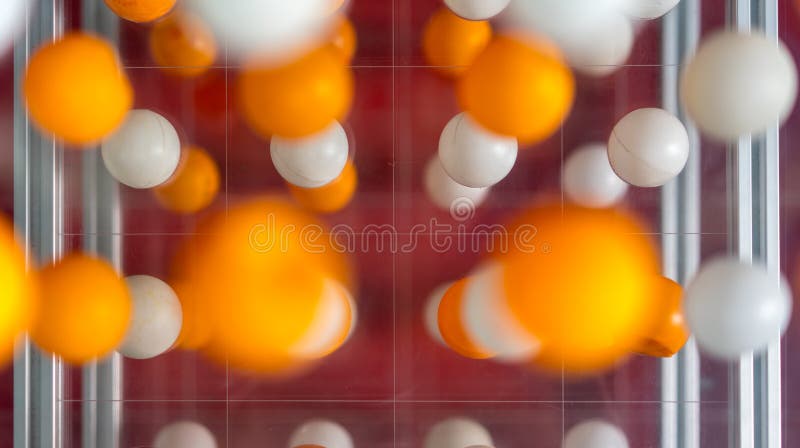 Orange und weiße Bälle, die in Perspektivenansicht schwimmen stockbilder Orange und weiße Bälle, die in Perspektivenansicht schwimmen stockbilder