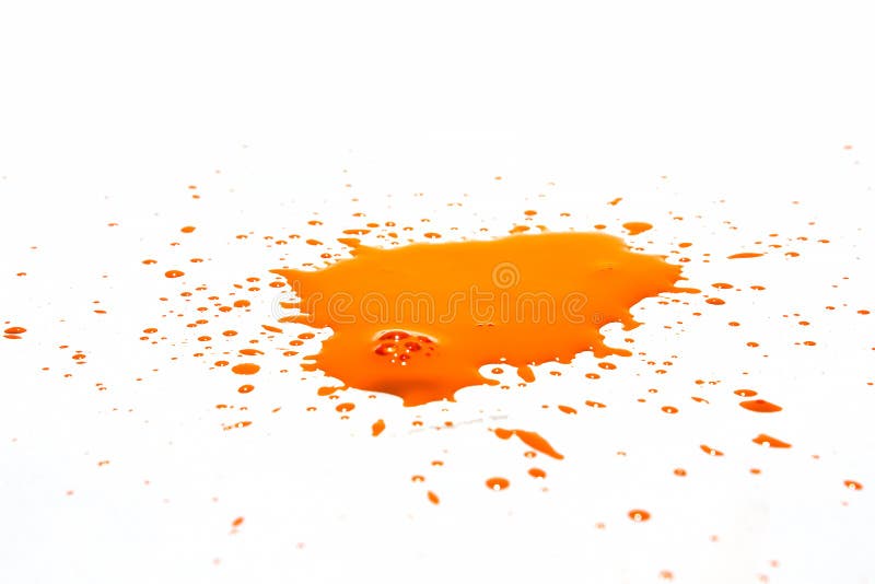 Orange Water Droplets Splashing on a White Background Stock Image
