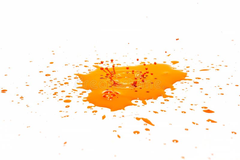 Orange Water Droplets Splashing on a White Background Stock Image