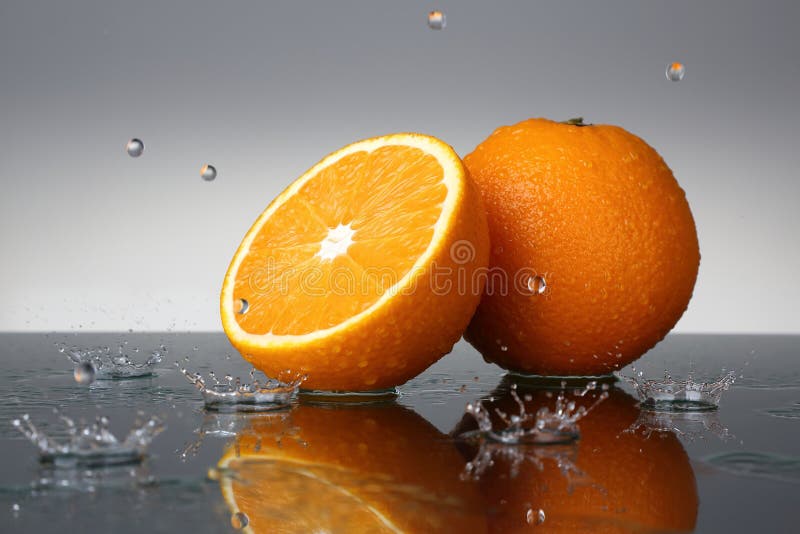 Orange and water drops stock image. Image of drop, rain 46734445
