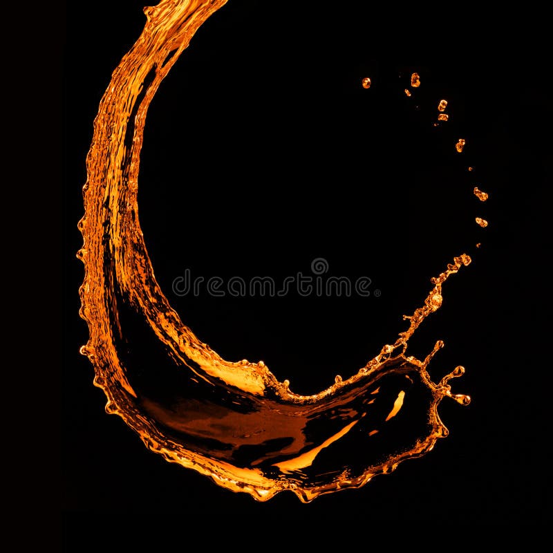 Orange water splash isolated on black