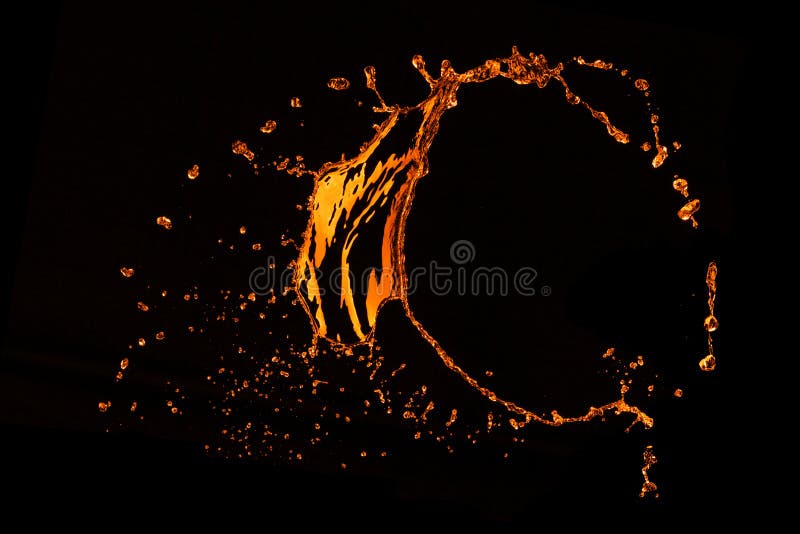 Orange water splash isolated on black