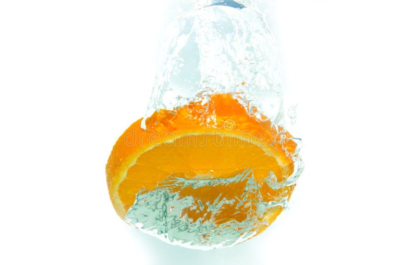 Drop Falling Into Orange Water With Splash Isolated On White Stock 4C6