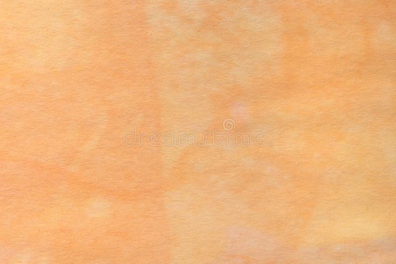 Orange watercolor pastel painted on paper background texture