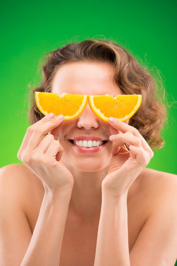 Orange wedges stock photo. Image of fruit, hands, beauty - 41473342