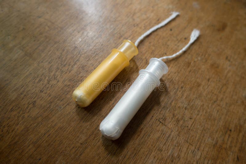 Orange Tampons on Yellow Background, Top View Stock Photo Image of intimate, sperm 219939466