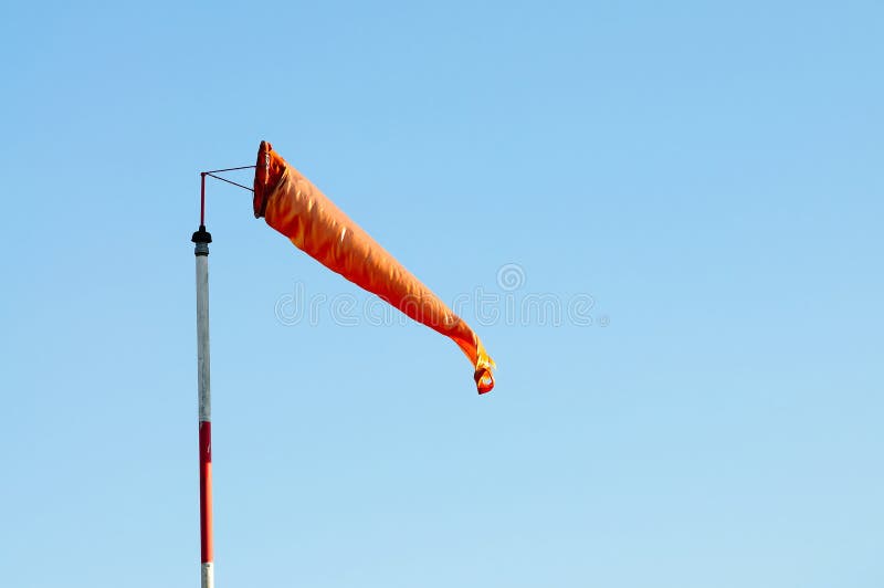 An Orange Windsock or Windvane Against the Blue Sky Stock Image Image