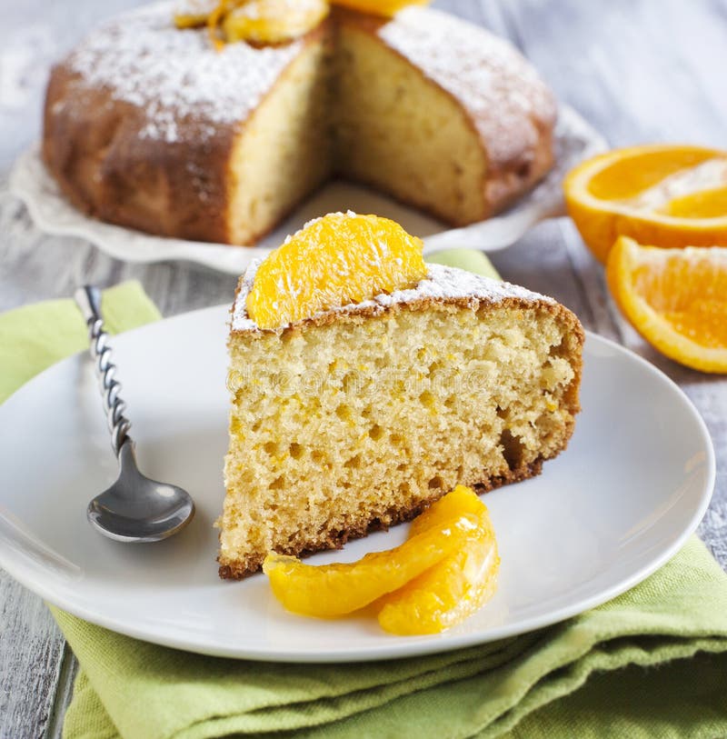 Orange yogurt cake stock photo. Image of plate, powdered 46981100