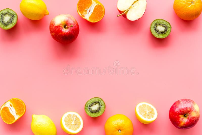 Oranges, Lemon, Apple, Kiwi and Grape - Healthy Food Concept with Fruits -  on Pink Background Top-down Frame Copy Space Stock Photo - Image of lemon,  space: 178137220