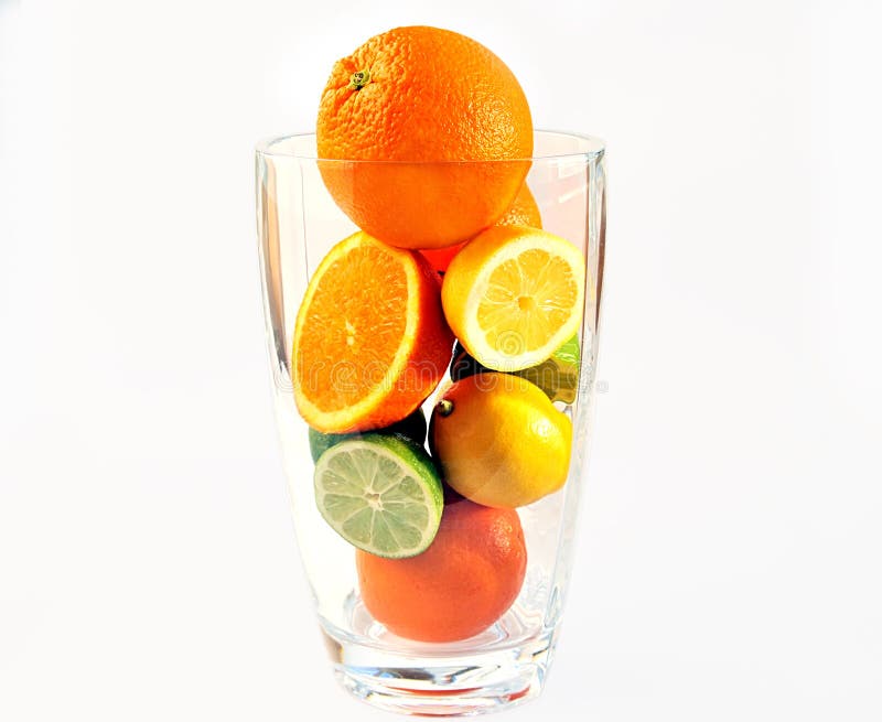 Oranges, Lemons and Limes in Vase. Stock Photo Image of slice, green