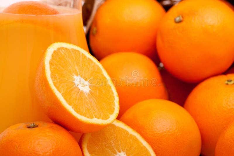 Oranges and orange juice stock image. Image of drink 12565517