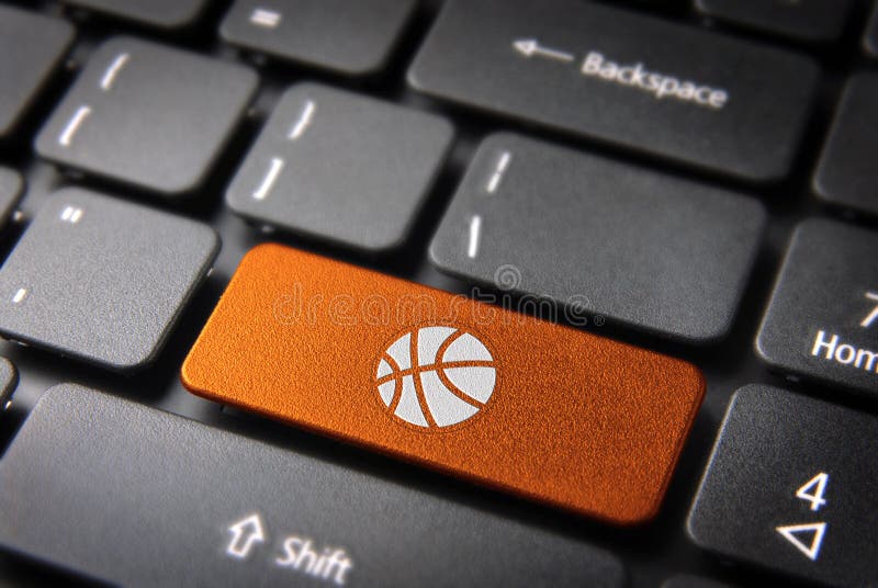 Sports key with basket ball icon on laptop keyboard. Included clipping path, so you can easily edit it. Sports key with basket ball icon on laptop keyboard. Included clipping path, so you can easily edit it.