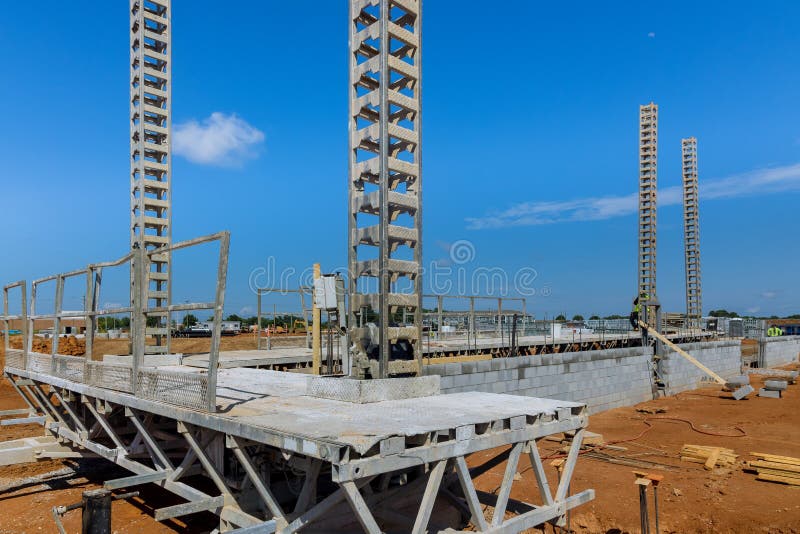 In Order To Mount Concrete Blocks on Concrete Walls, Scaffolding Had To