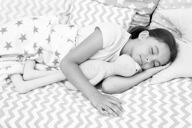 Girl happy child lay bed pillow and blanket bedroom. Lullaby concept. Ways to fall asleep faster. Fall asleep as fast as possible. Fall asleep faster and sleep better. Healthy sleep. Sweet dreams. Girl happy child lay bed pillow and blanket bedroom. Lullaby concept. Ways to fall asleep faster. Fall asleep as fast as possible. Fall asleep faster and sleep better. Healthy sleep. Sweet dreams.