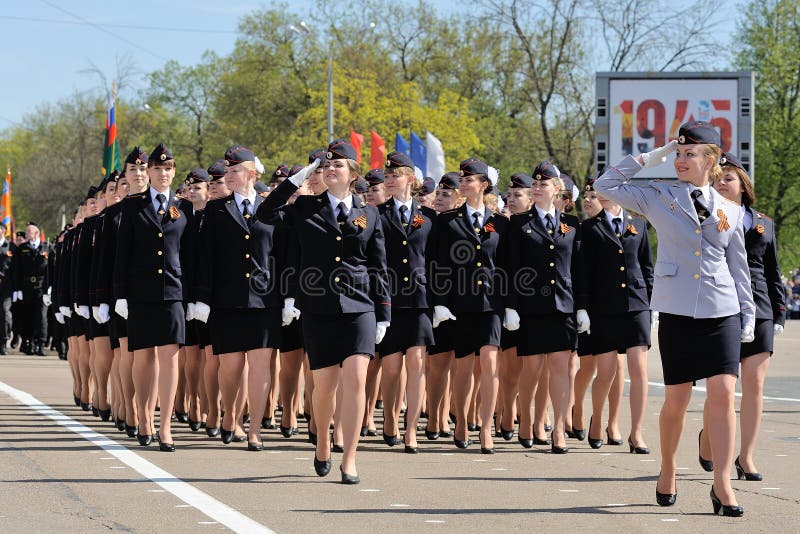 Orel, Russia - May 09, 2015: Celebration of the 70th anniversary of the Victory Day (WWII). Military girl cadets in uniform marching in parade horizontal. Orel, Russia - May 09, 2015: Celebration of the 70th anniversary of the Victory Day (WWII). Military girl cadets in uniform marching in parade horizontal