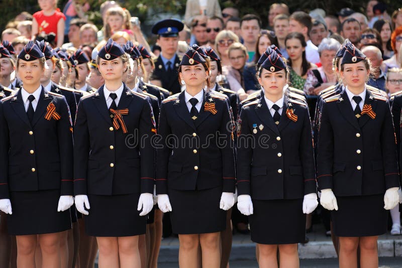 Orel, Russia - May 9, 2016: Celebration of 71th anniversary of the Victory Day (WWII). Girls in russian military uniform standing in row horizontal. Orel, Russia - May 9, 2016: Celebration of 71th anniversary of the Victory Day (WWII). Girls in russian military uniform standing in row horizontal